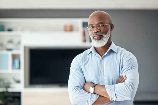 Mature man looking at camea 